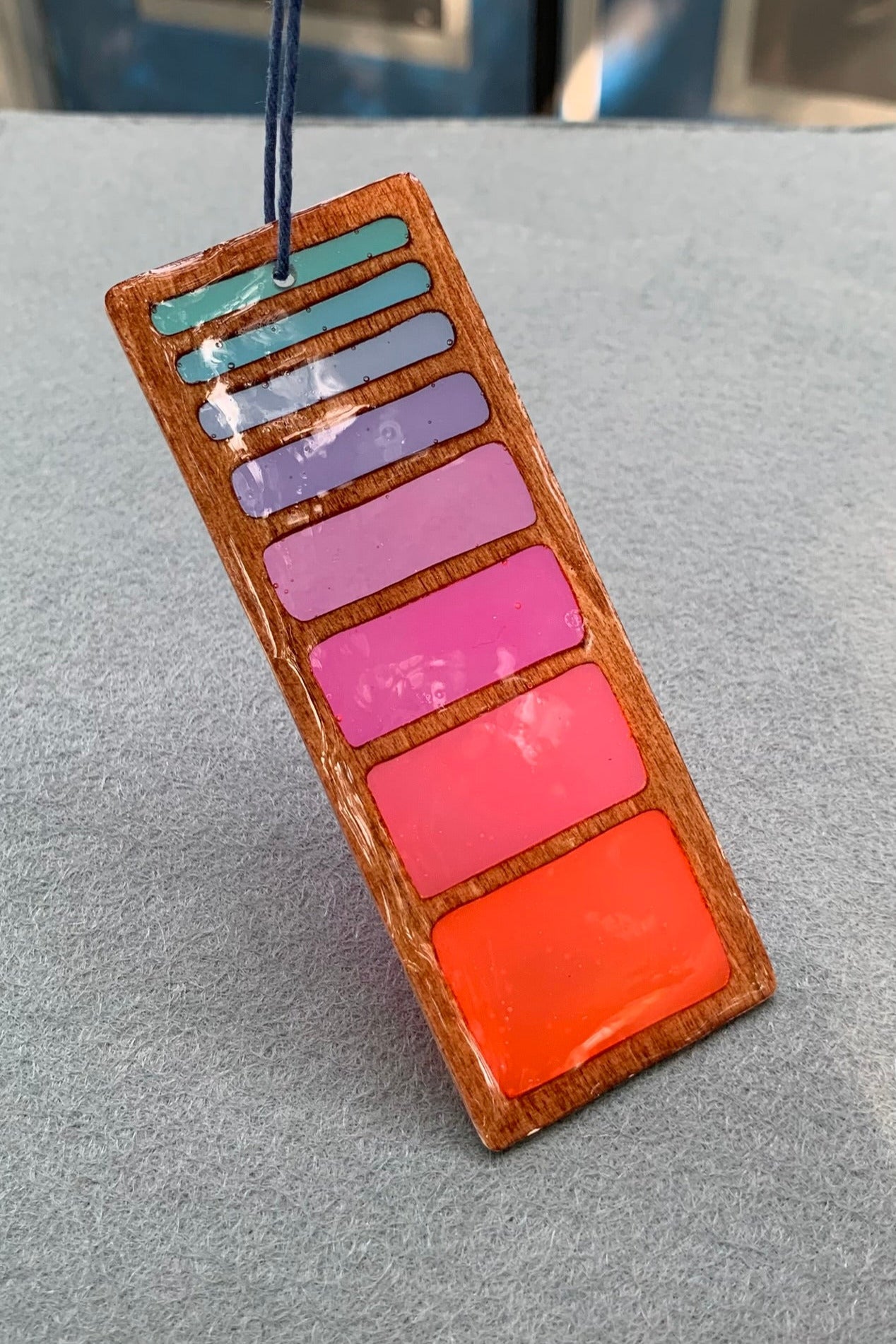 Hand cut wooden bookmark with retro line gradient colors and UV resin translucent colors