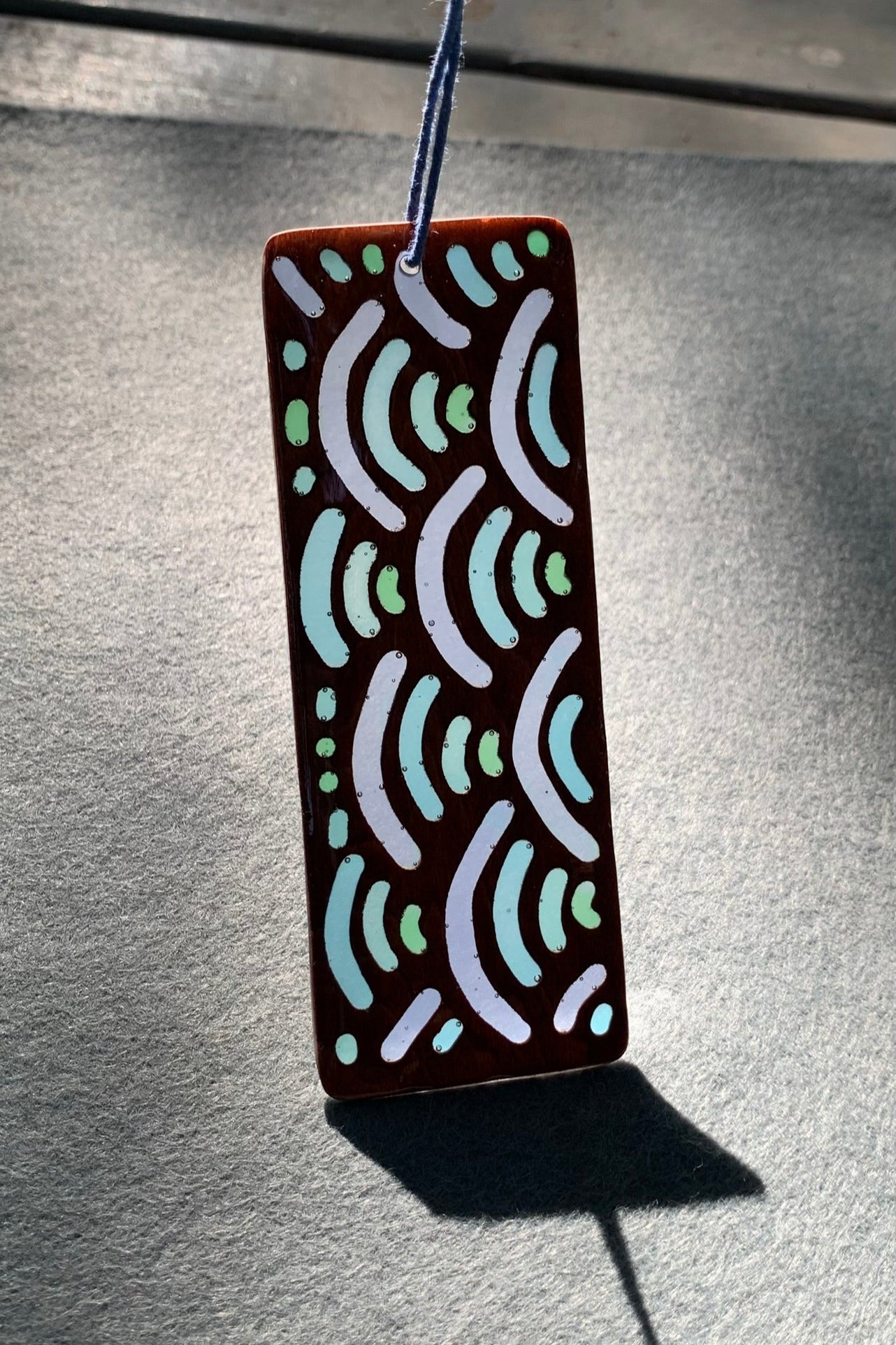 Hand-carved basswood bookmark with Japanese blue wave UV resin design